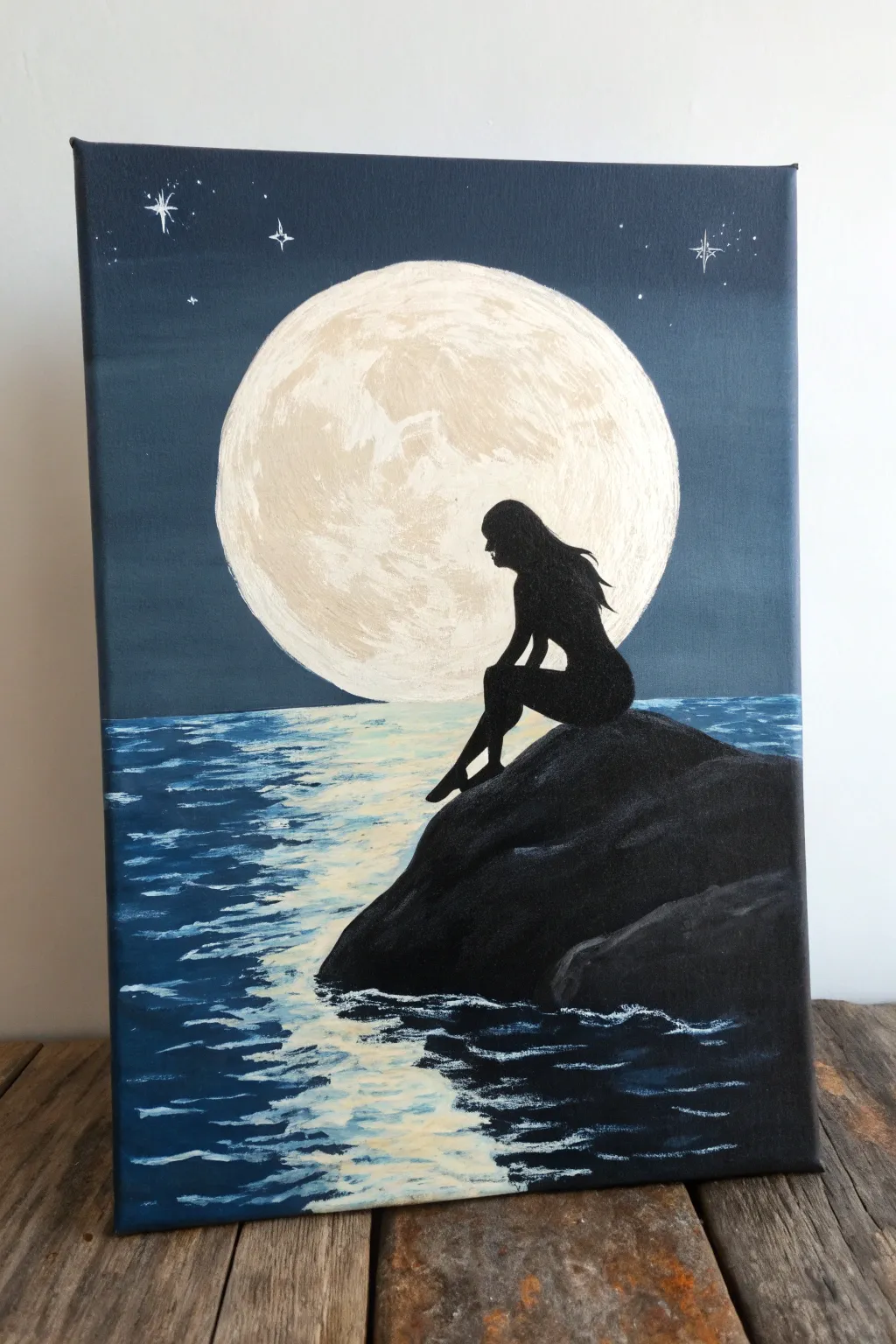 Moonlit mermaid silhouette on a rock, bold acrylic contrast with calm Scandinavian minimal vibes