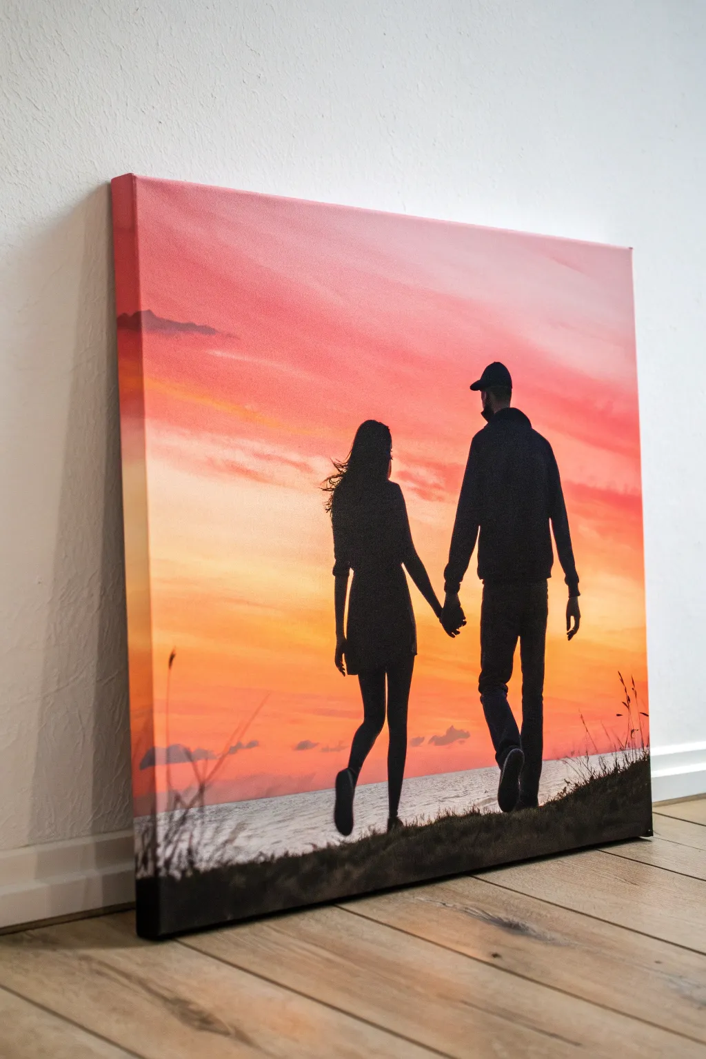 Minimal couple silhouette at sunset on canvas, a romantic anniversary idea with space to personalize