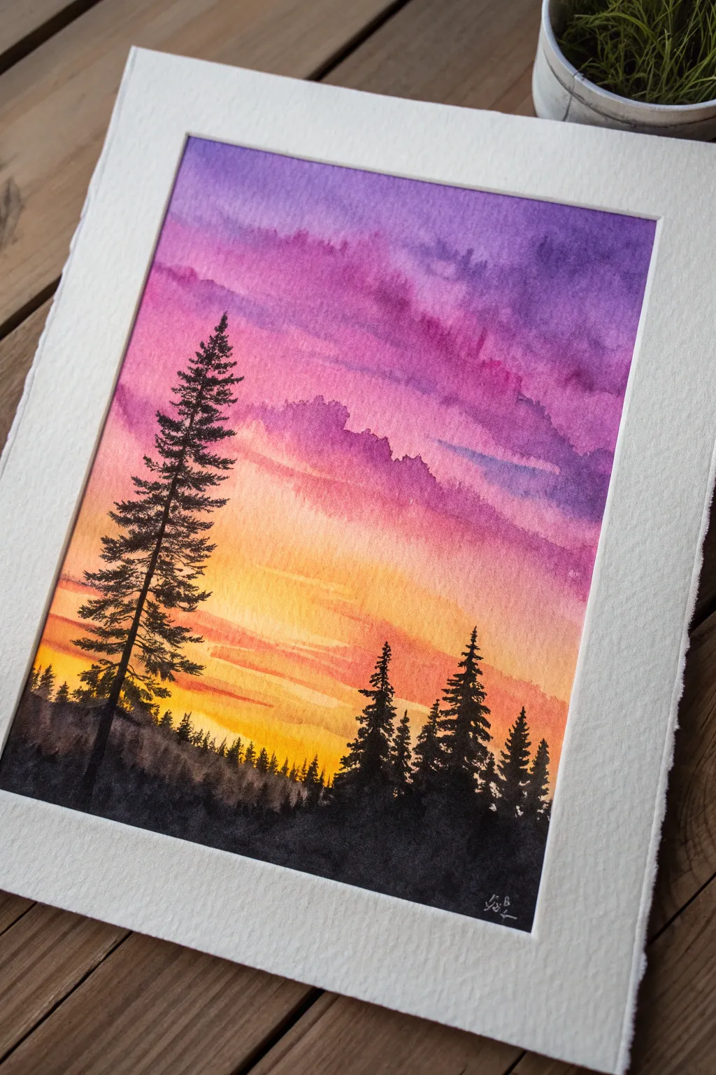 Vibrant sunset gradient with crisp pine silhouettes, a minimalist-boho painting idea to try.