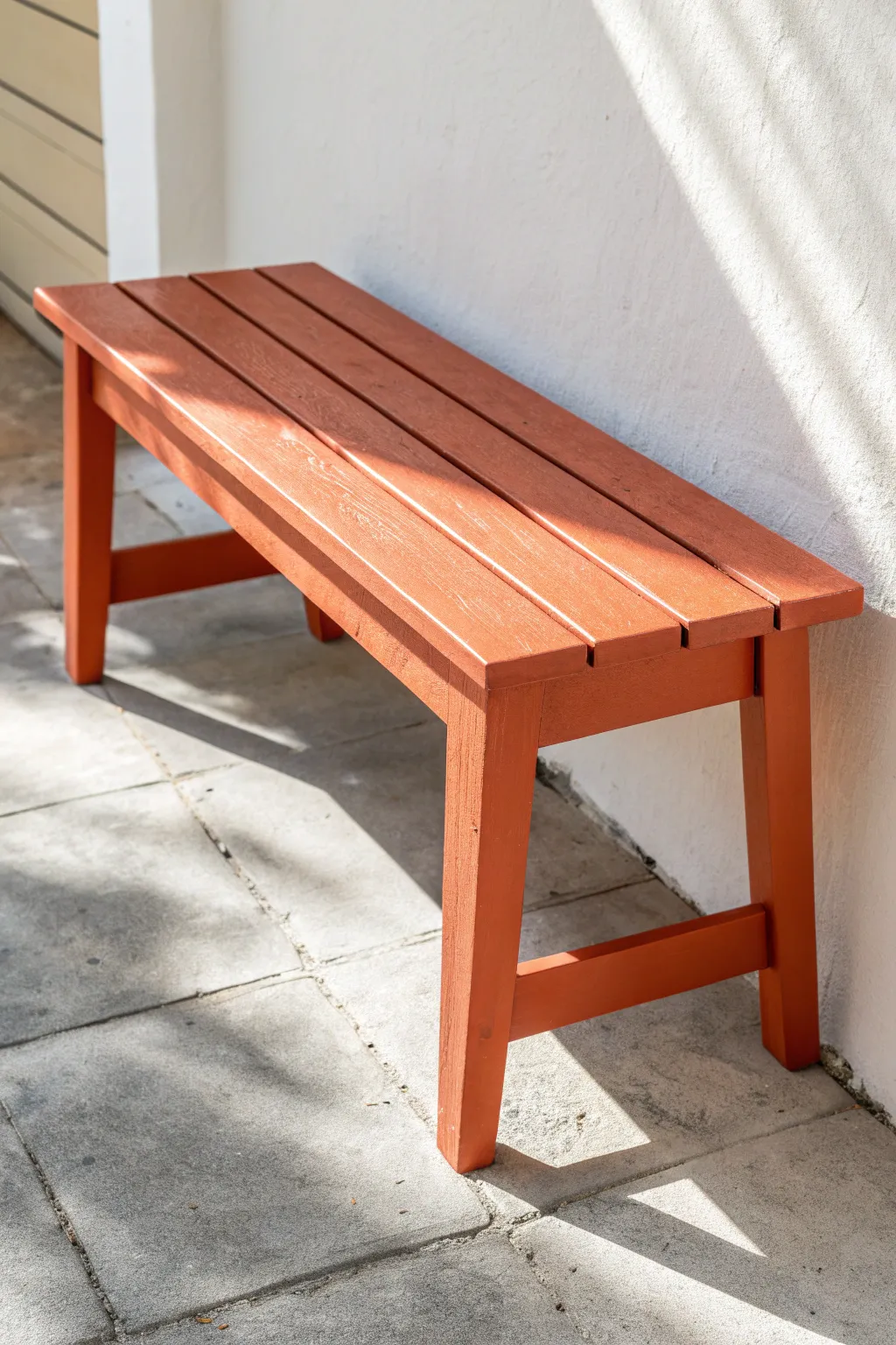 A bold solid-color bench makeover that turns simple wood into a modern statement piece