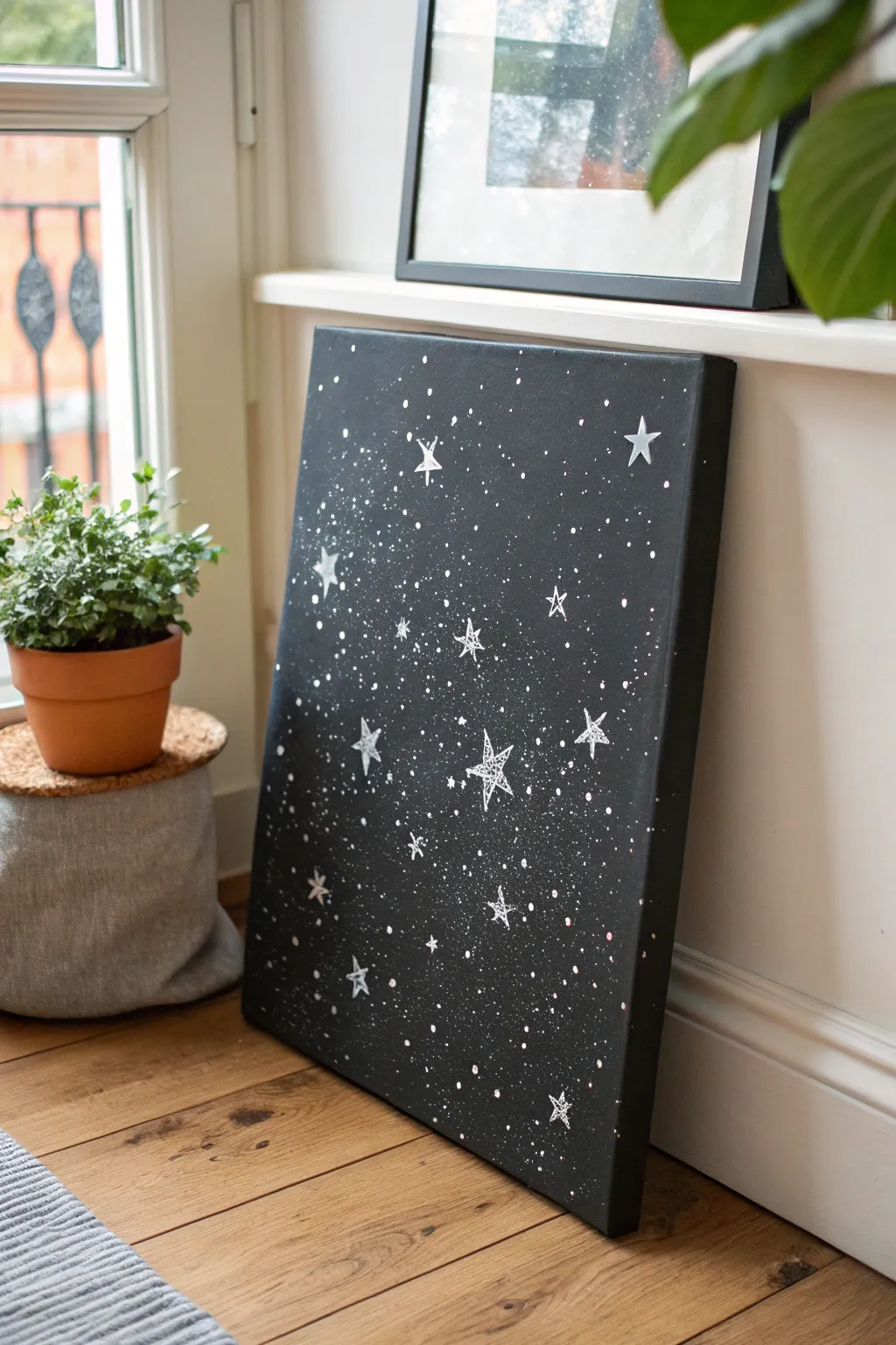 Dreamy black starry night canvas with delicate white splatter and soft space haze, high contrast