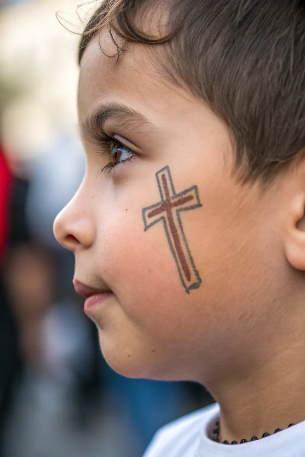 Simple cheek cross face paint with soft glow, clean lines, and calm minimalist vibes.