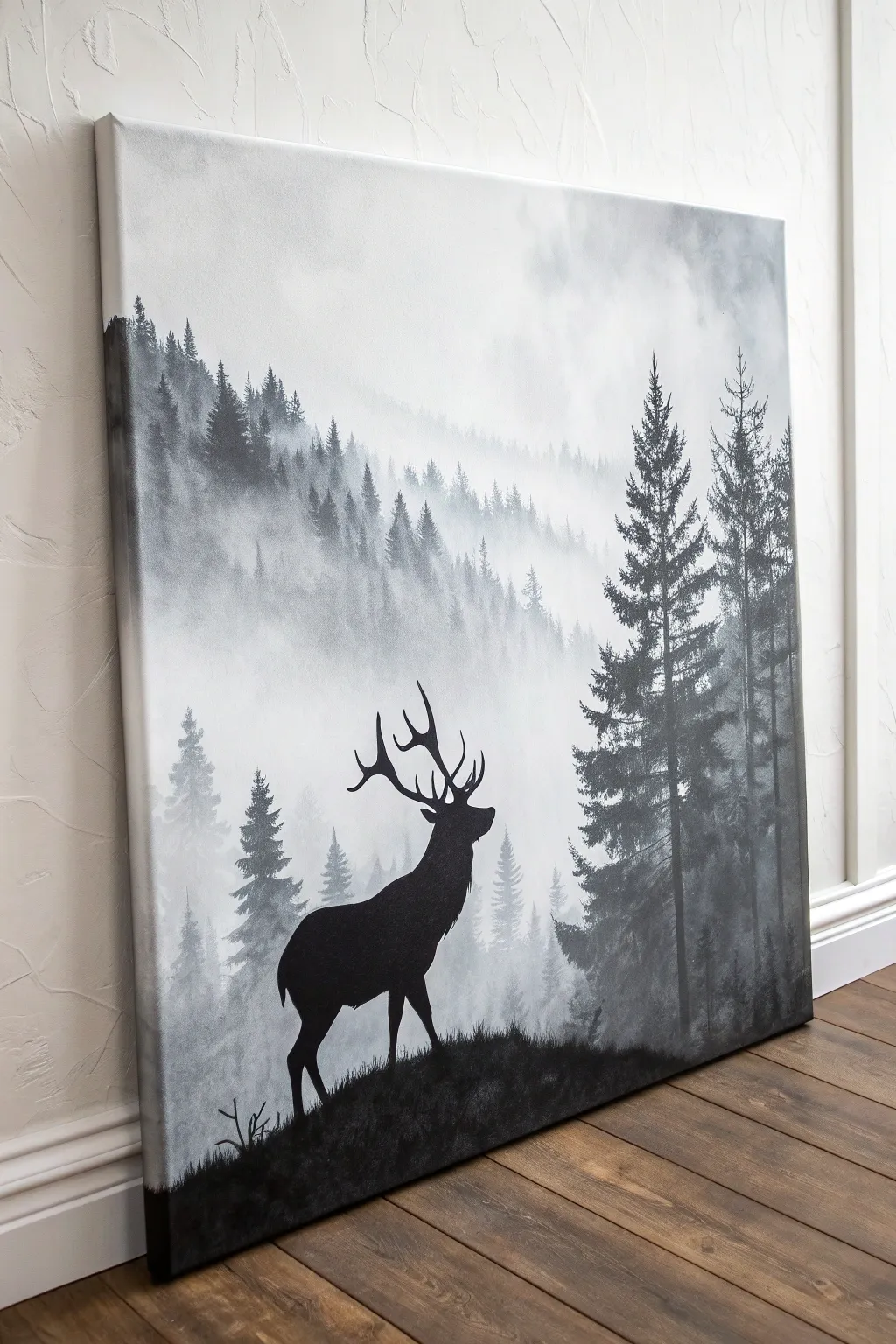Monochrome stag silhouette in misty pines, a rugged minimalist canvas idea with crisp contrast