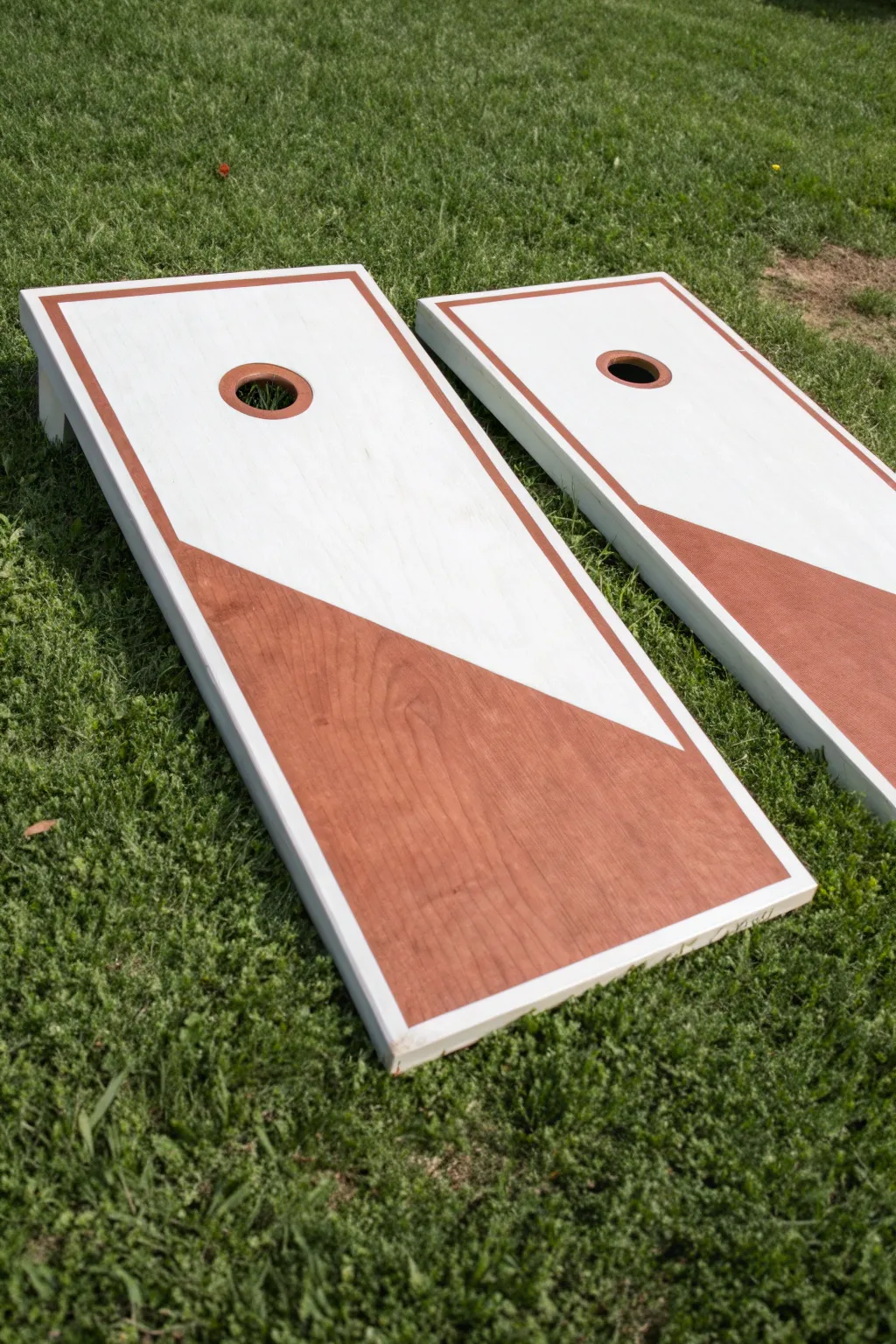 Classic two-tone cornhole boards with crisp painted borders for clean, modern contrast.