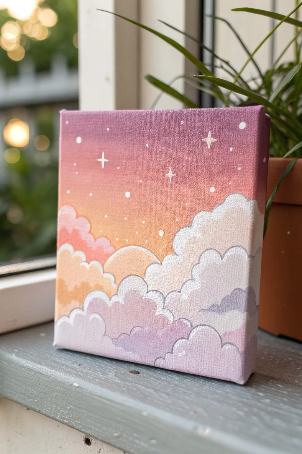 Pastel sunset mini canvas with cotton-candy clouds and tiny sparkles, simple and dreamy