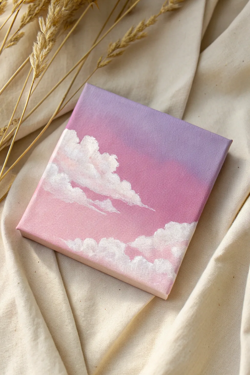 Cotton-candy gradient sky on a square canvas with dreamy clouds and soothing negative space