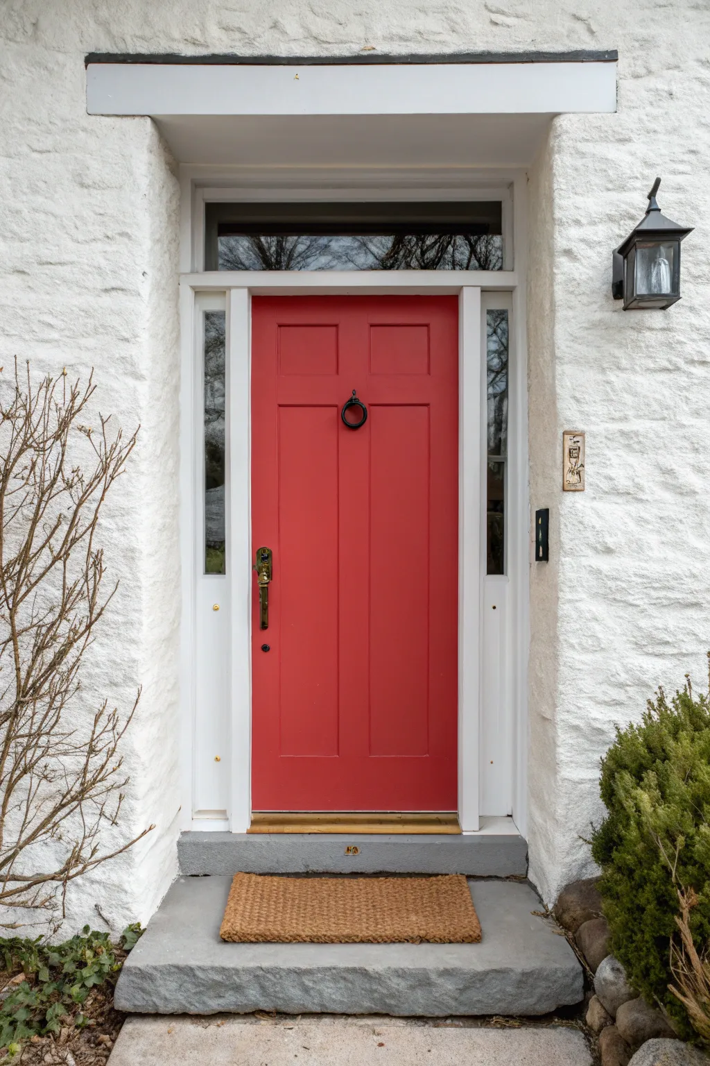 Bold color-block front door with crisp trim for modern, minimal curb appeal