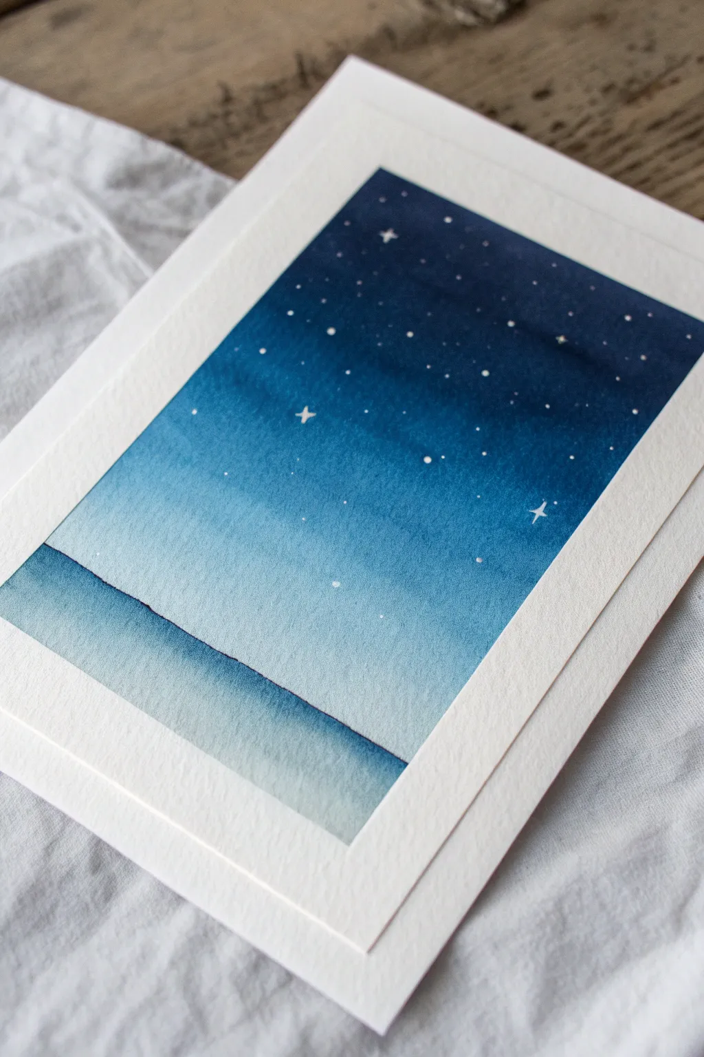 Ombre blue night sky: a simple navy-to-pale gradient that feels calm, modern, and easy to paint