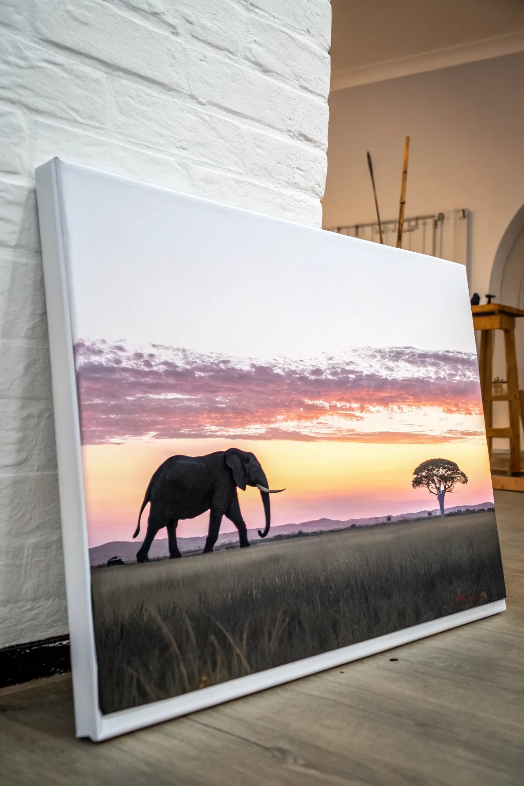 Classic elephant silhouette on a serene sunset gradient, a minimal acrylic painting idea