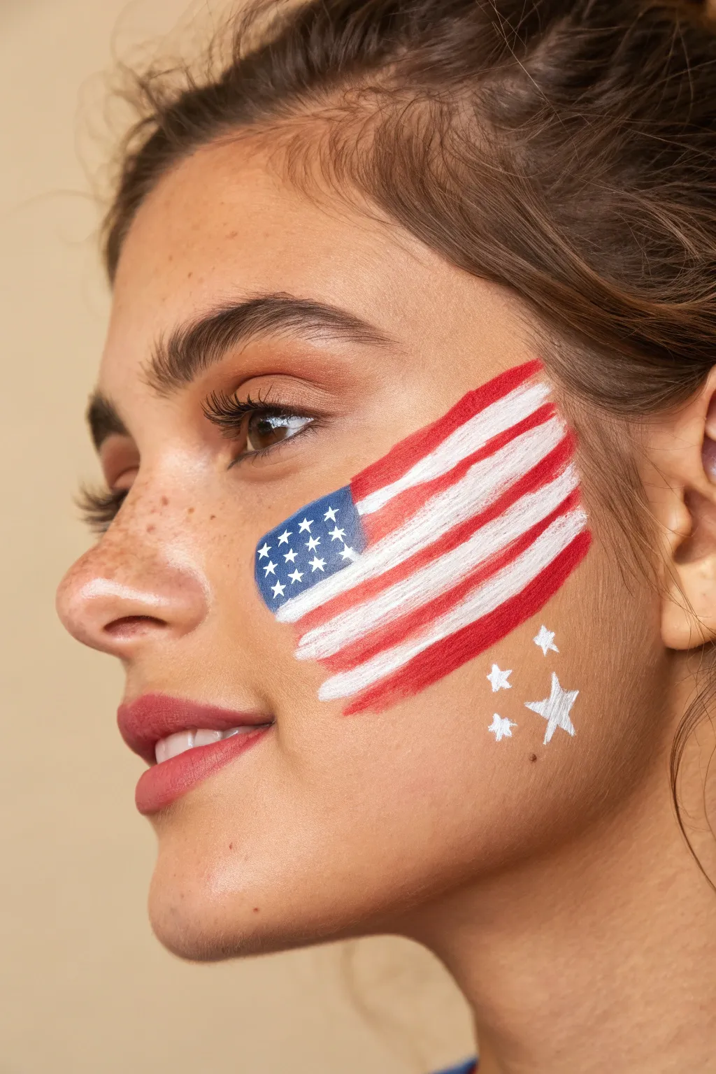 Classic stars and stripes cheek flag face paint, crisp lines and minimalist boho July 4 look