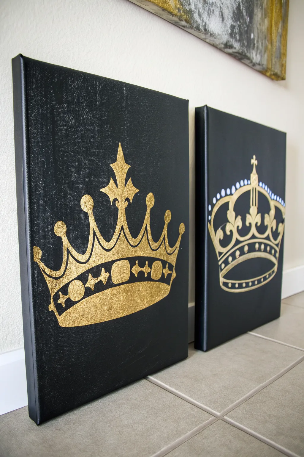 Classic king and queen crown diptych in shimmering gold over matte black, clean and timeless