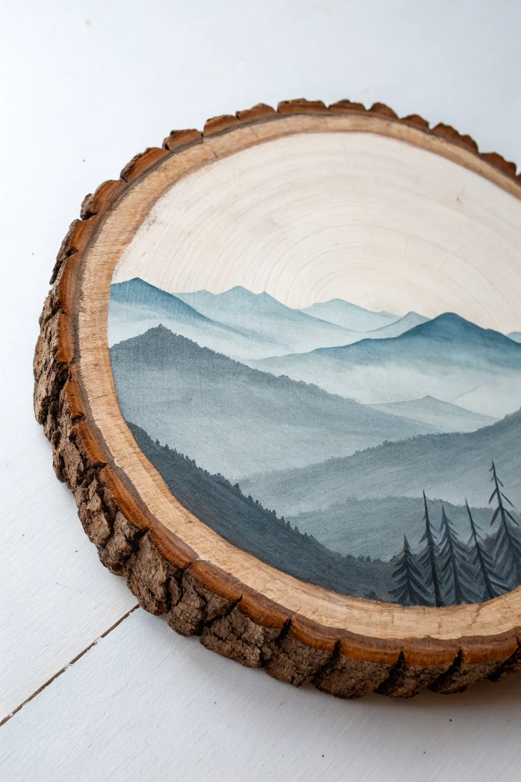 Rustic mountain mini landscape on a wood slice, soft mist layers and glowing grain.