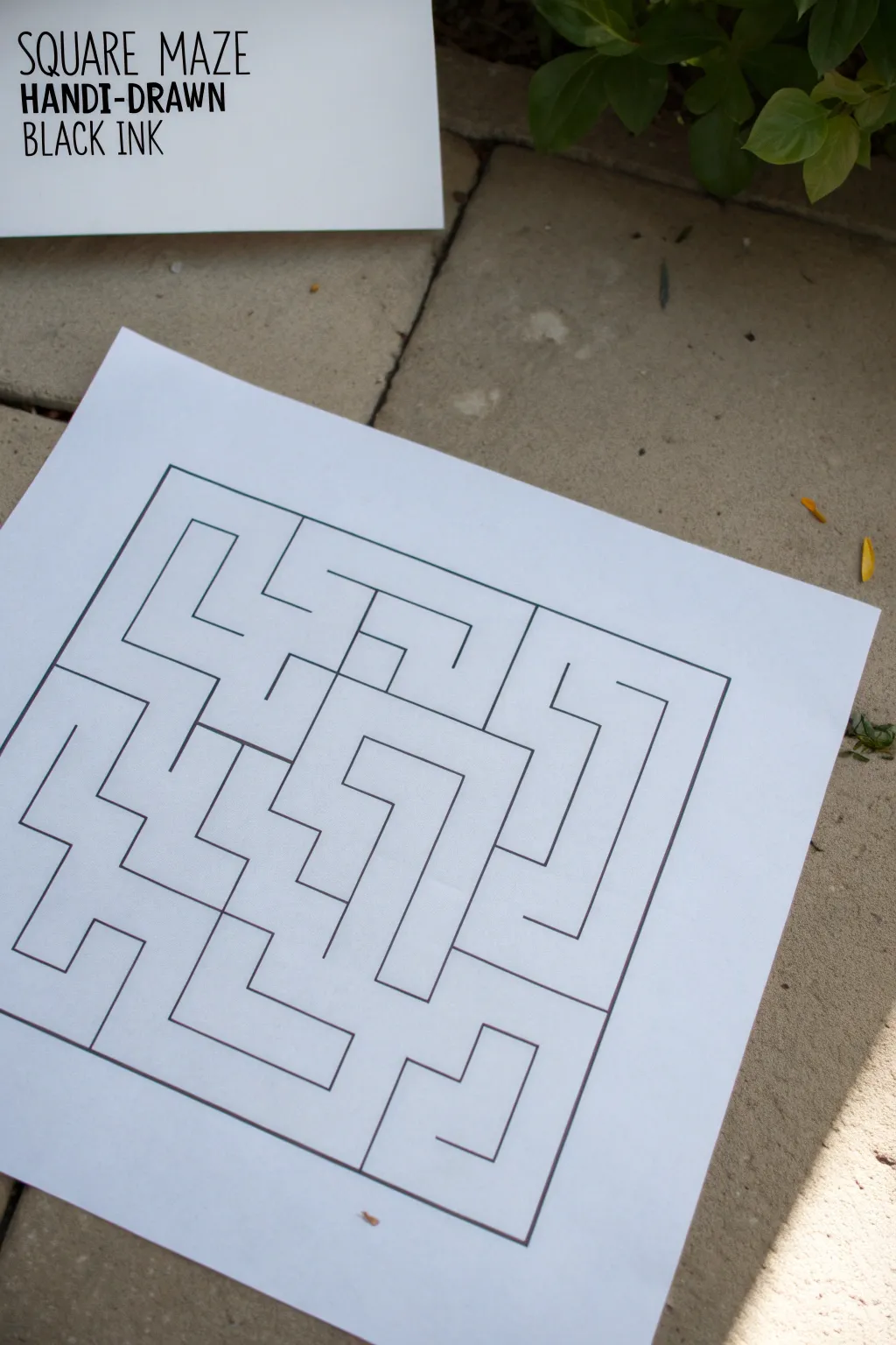 Classic square grid maze in black ink, crisp lines and calm Scandinavian minimal style.