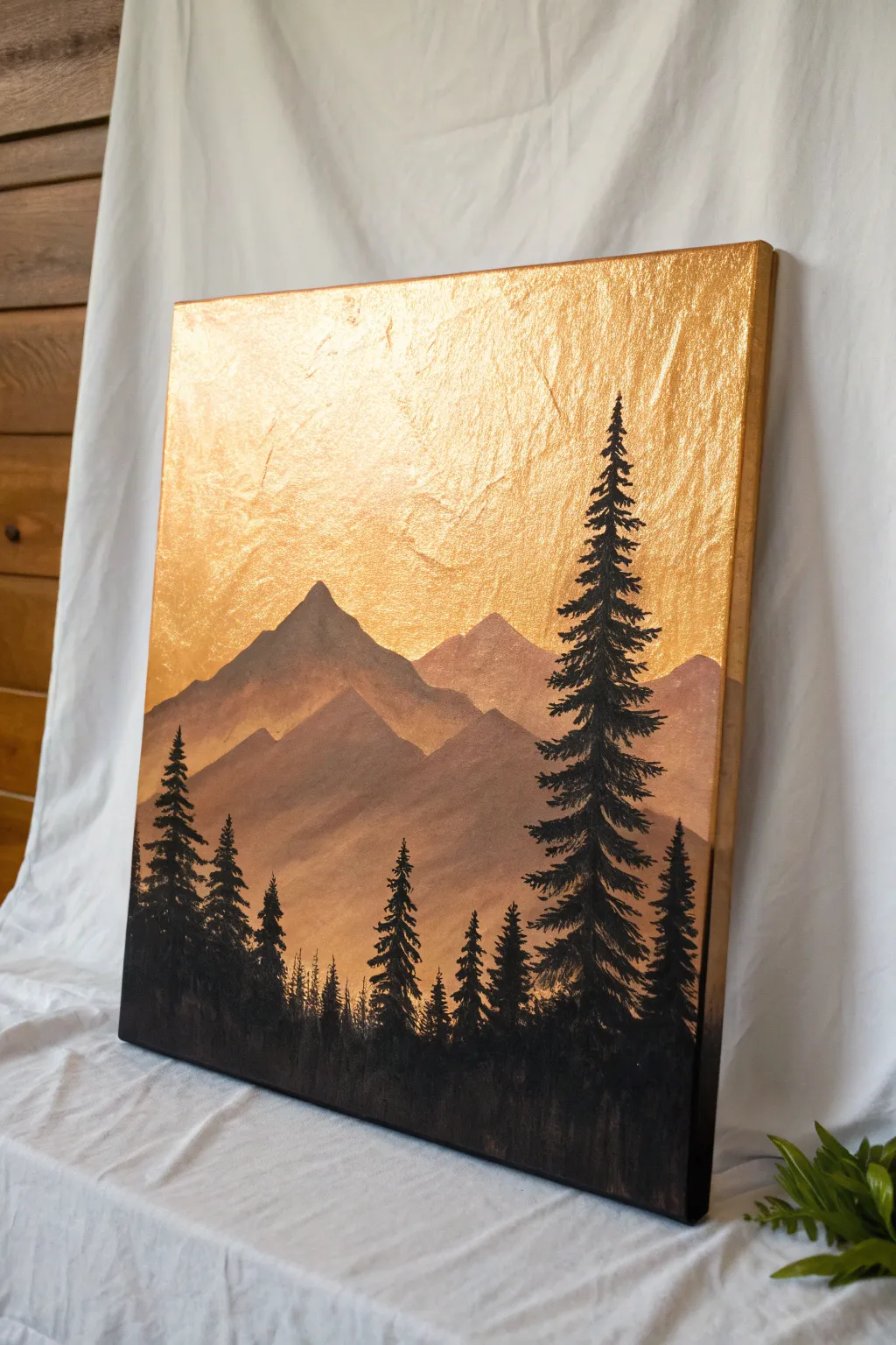 Metallic gold-to-copper sunset with bold black silhouettes for a minimalist acrylic statement.