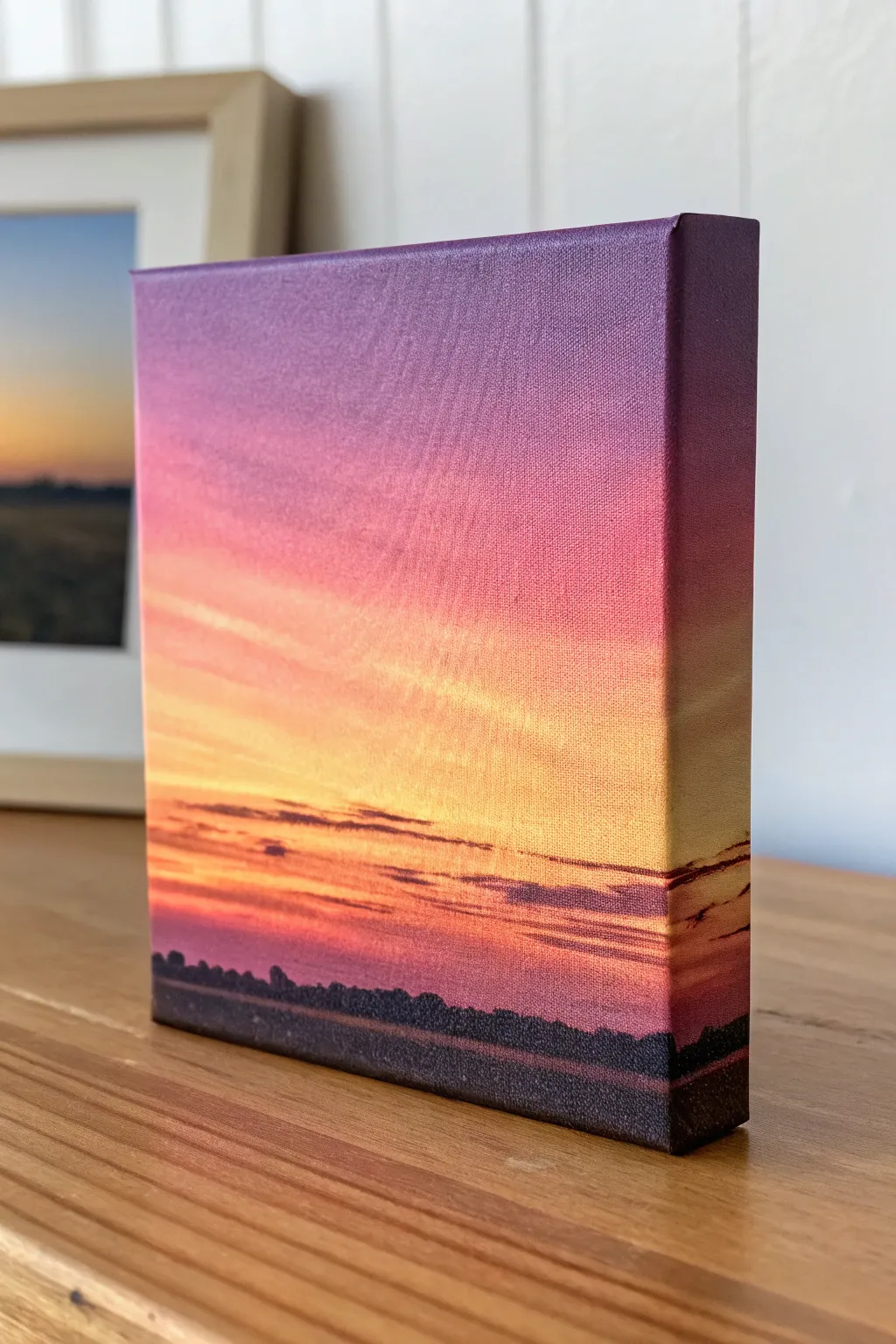 Mini canvas sunset gradient: golden glow melting into pink and purple with a crisp horizon line.