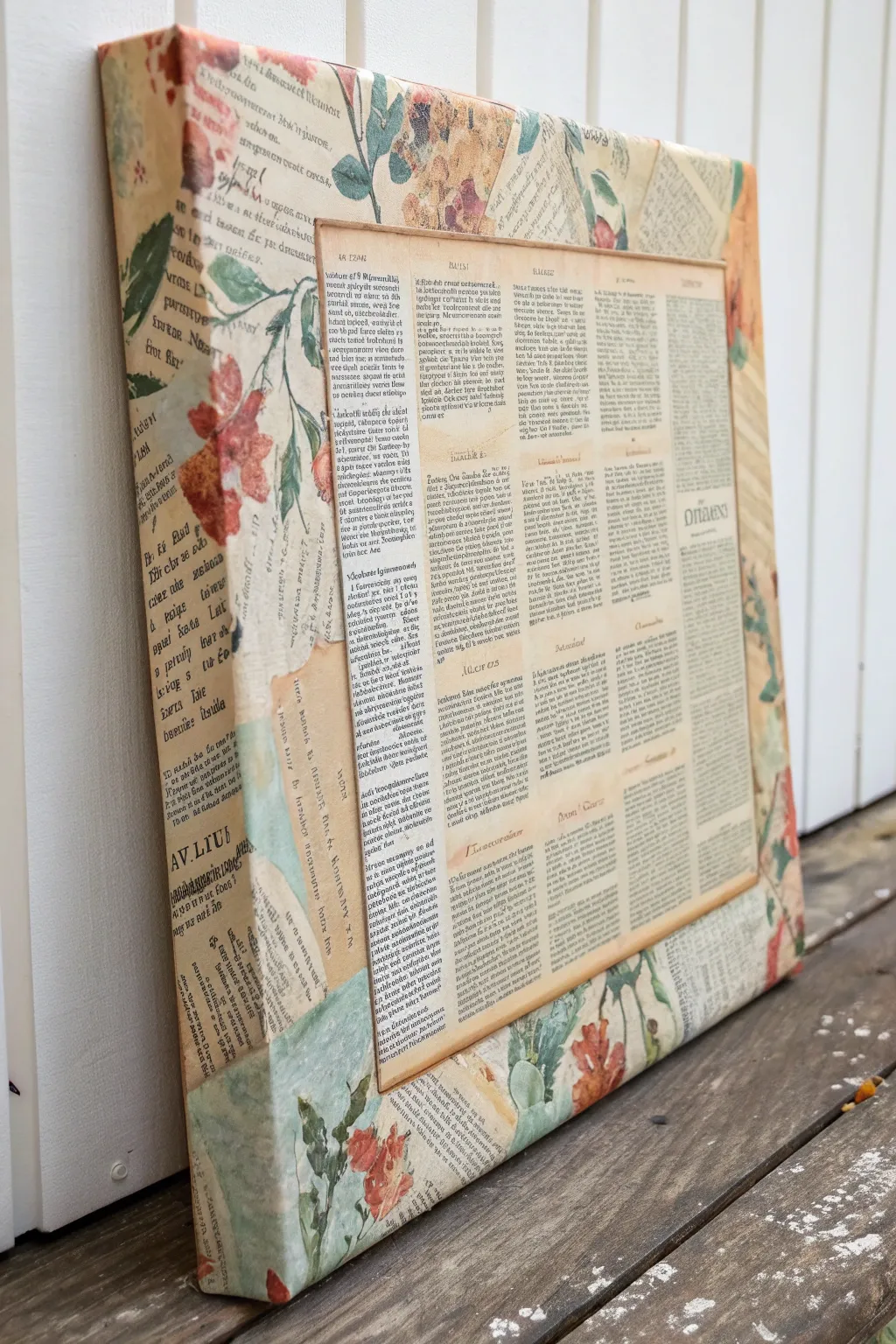 Classic mixed media layers with torn pages, patterned paper, and airy acrylic swipes.