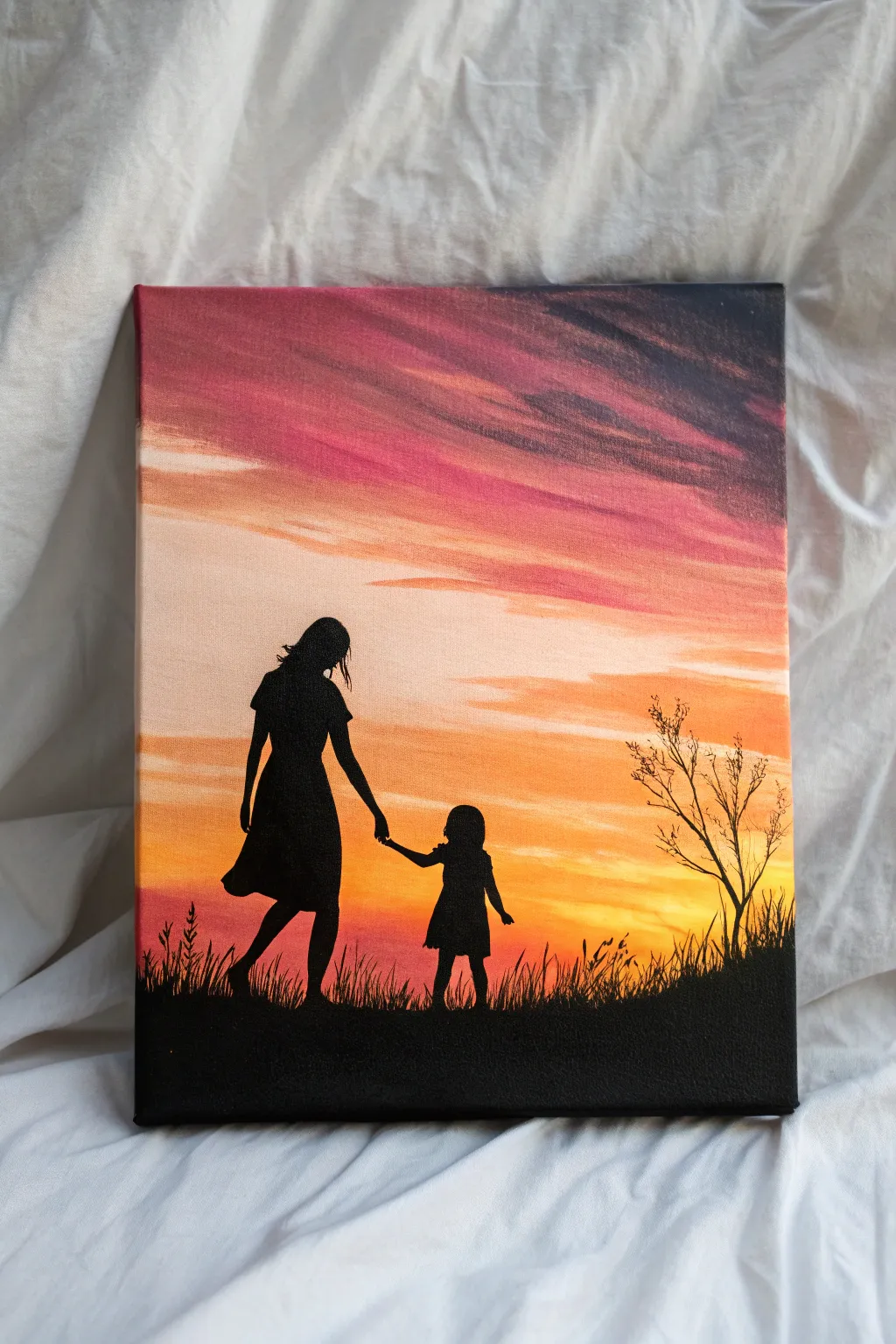 Simple sunset gradient with mother and daughter silhouette, an easy canvas idea to recreate