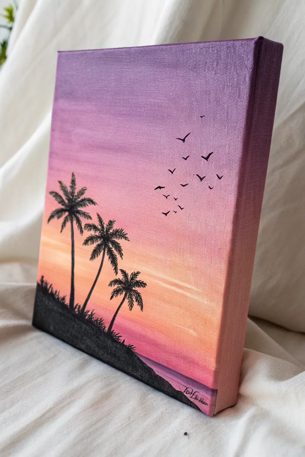 Classic sunset silhouette canvas with warm gradient glow and crisp black palms for an easy paint night