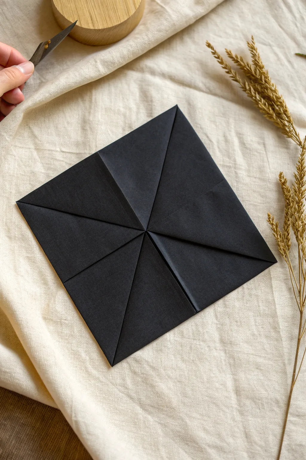 Classic Notan cut and flip: one simple fold creates perfectly balanced positive and negative space.