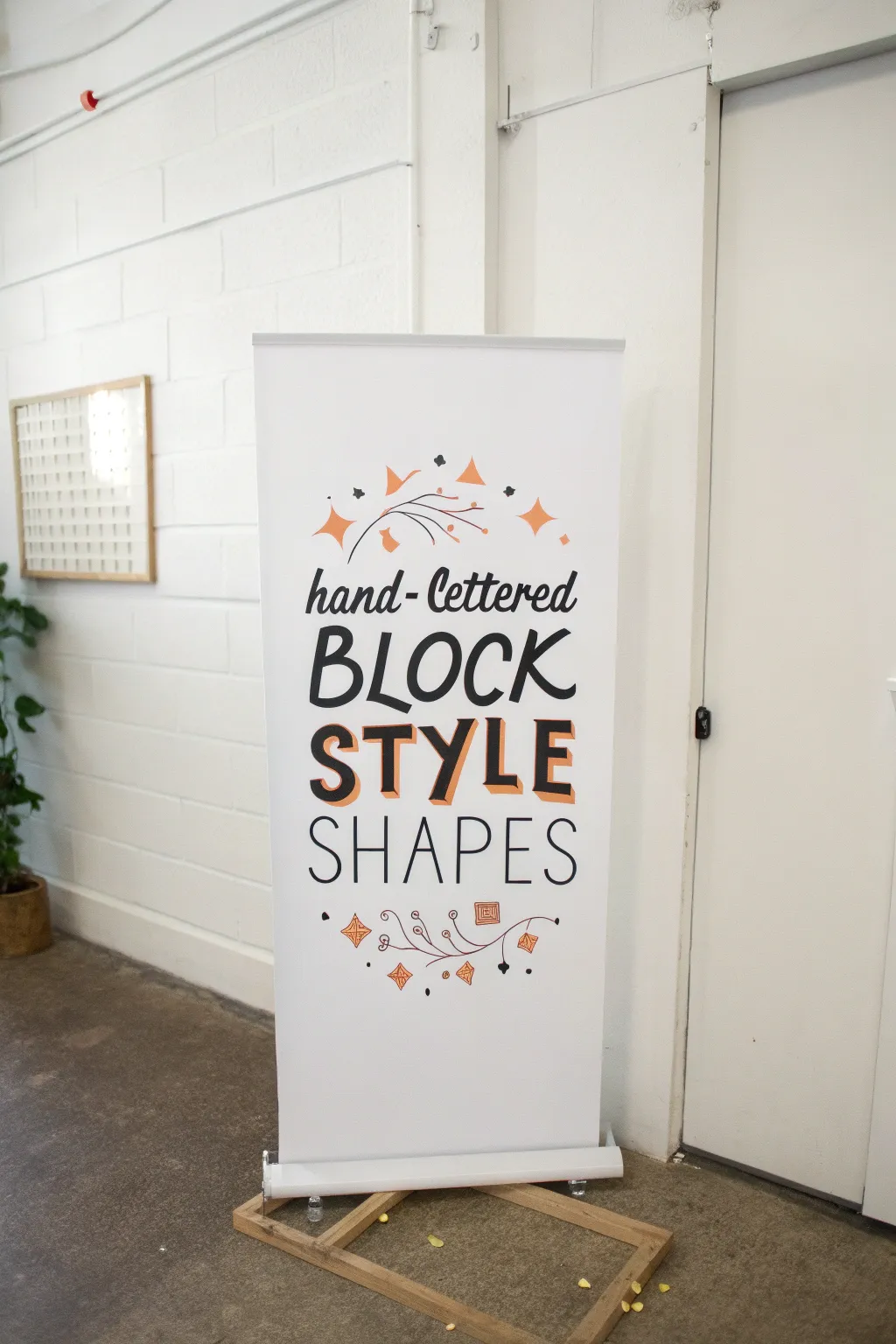 Poster board drawing idea: oversized bold lettering look with clean space and minimal boho doodles