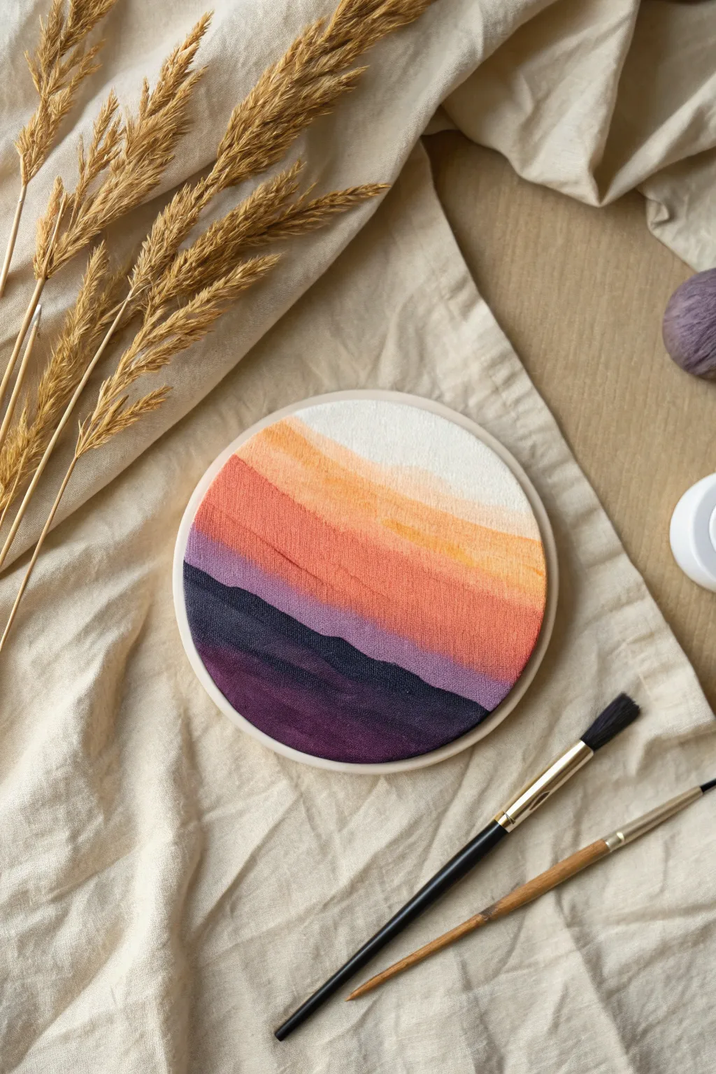 Capture the magic of dusk with this dreamy gradient sunset circle painting.
