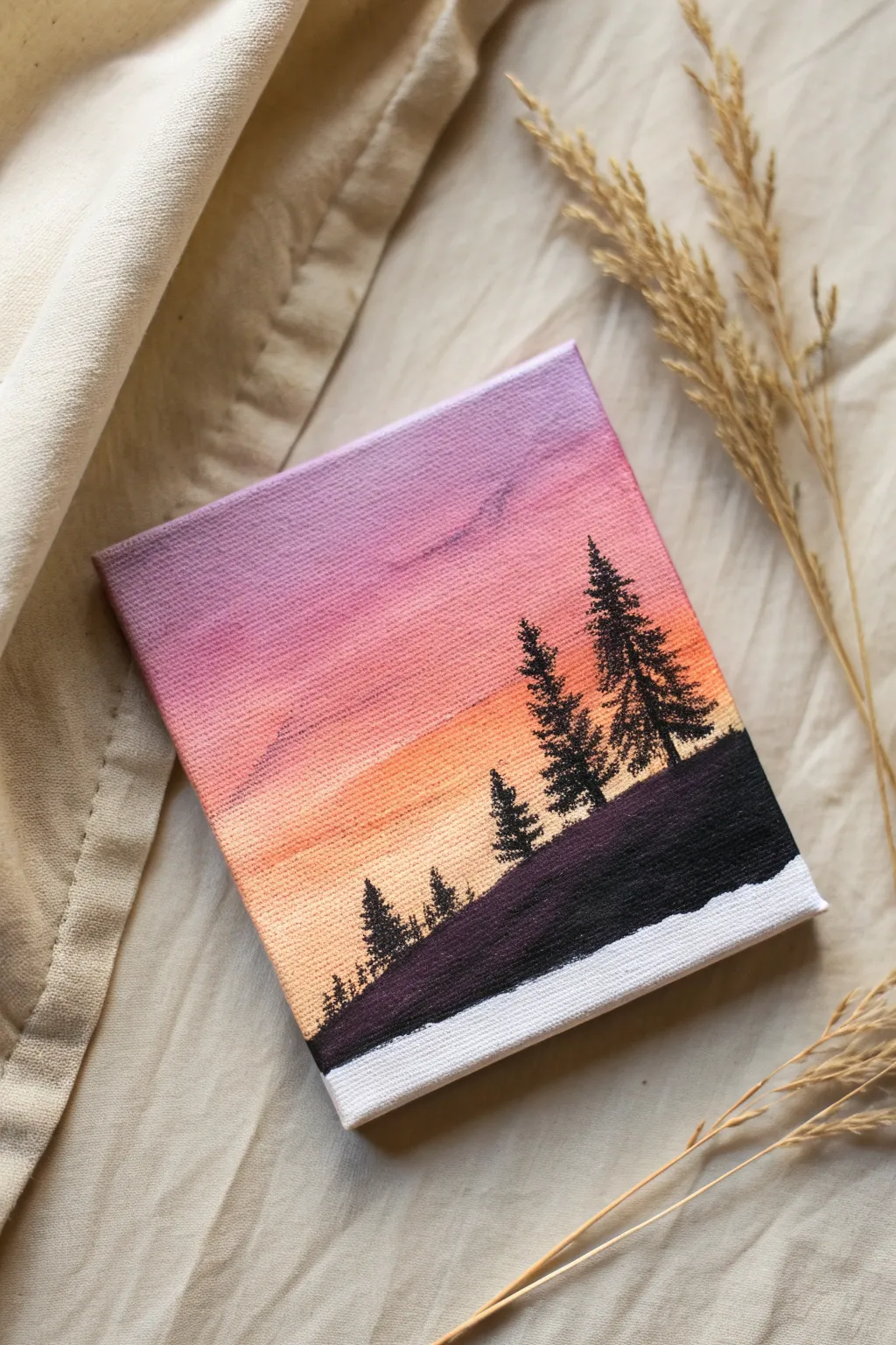 Mini sunset gradient acrylic on a tiny square canvas, with crisp black tree silhouettes and calm boho minimalism