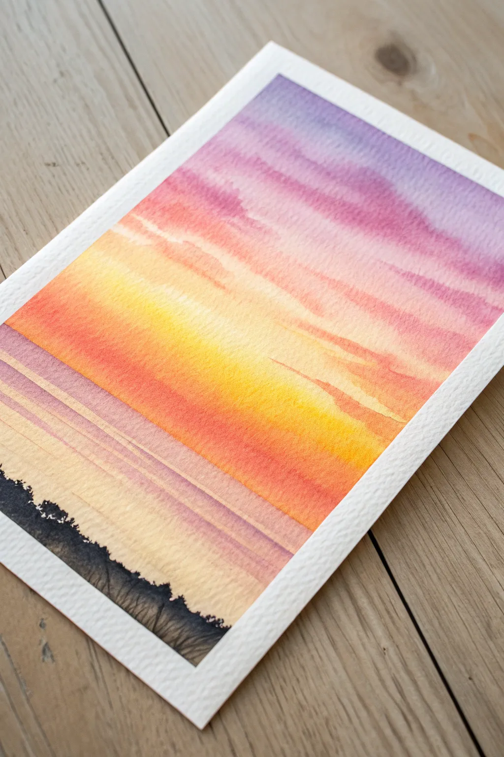Classic sunset gradient wash: warm yellow to violet with a clean horizon line and soft texture