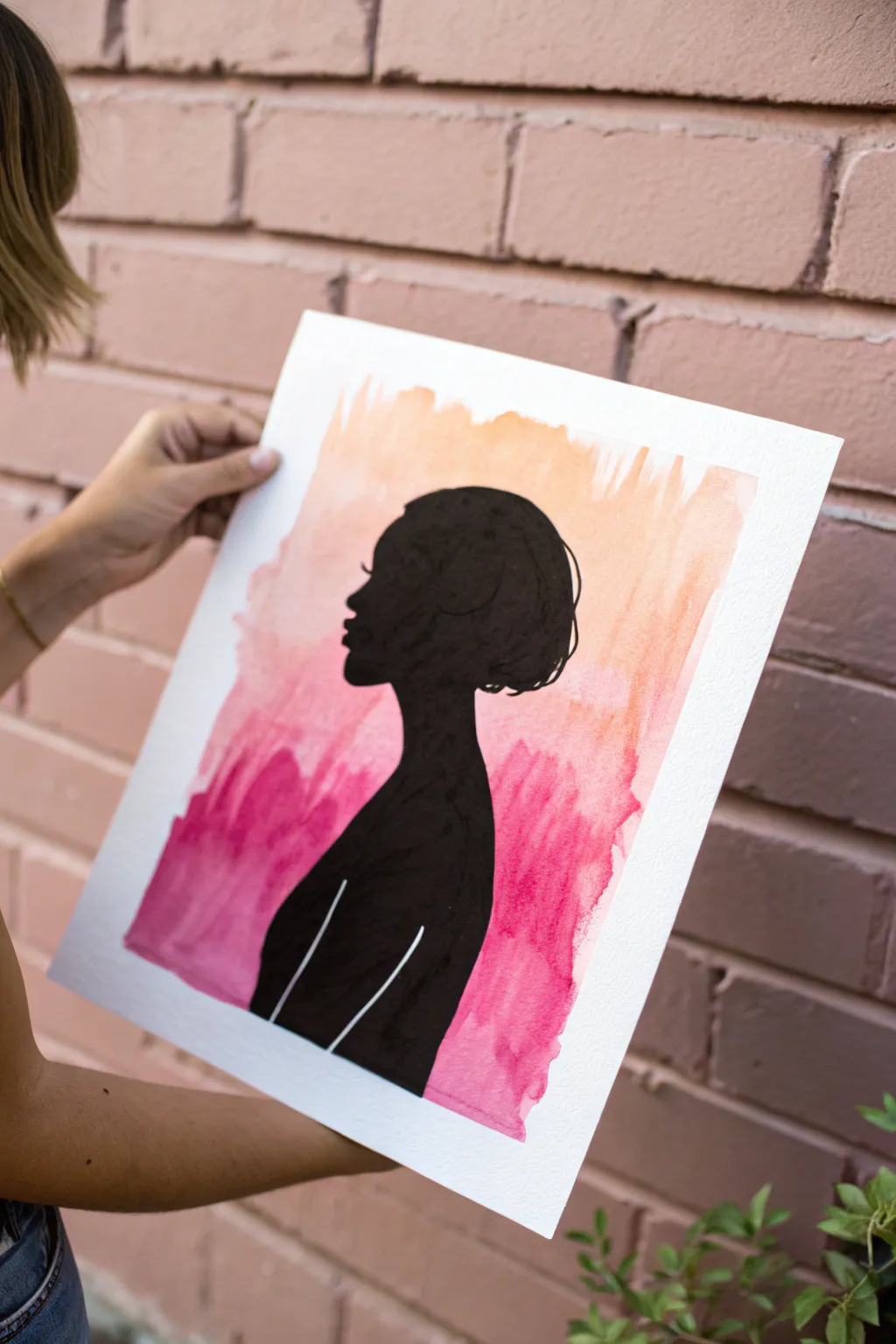 Easy neon pop portrait idea: faceless black girl silhouette with bold hair on a neon pink backdrop