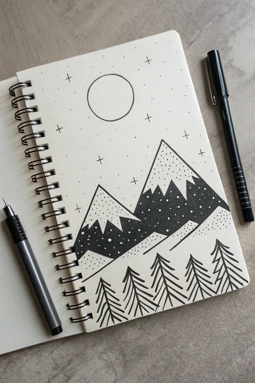 Bold black marker sky with white negative-space mountains and a clean sun, simple and striking