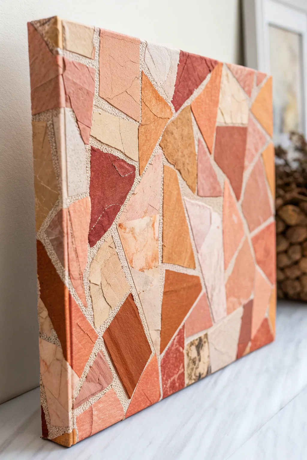 Warm-toned magazine collage canvas with a playful scrap pile for minimalist boho craft inspo.