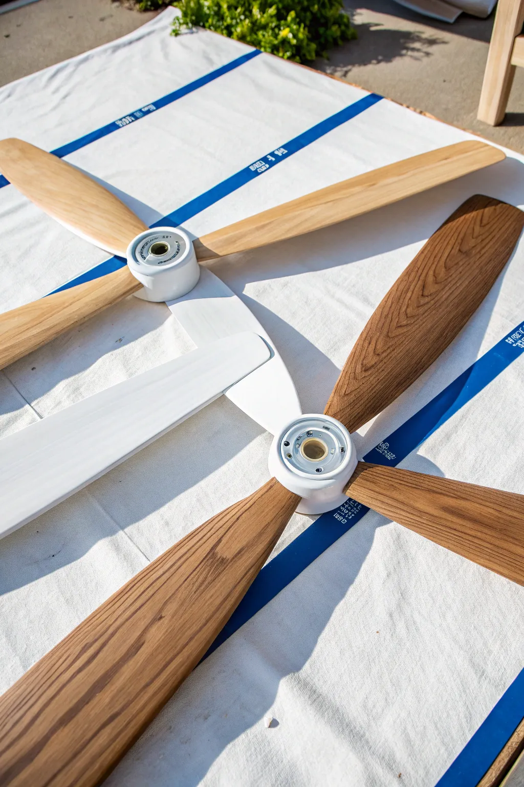 Minimalist dipped-tip ceiling fan blades with crisp tape lines for chic color-block style