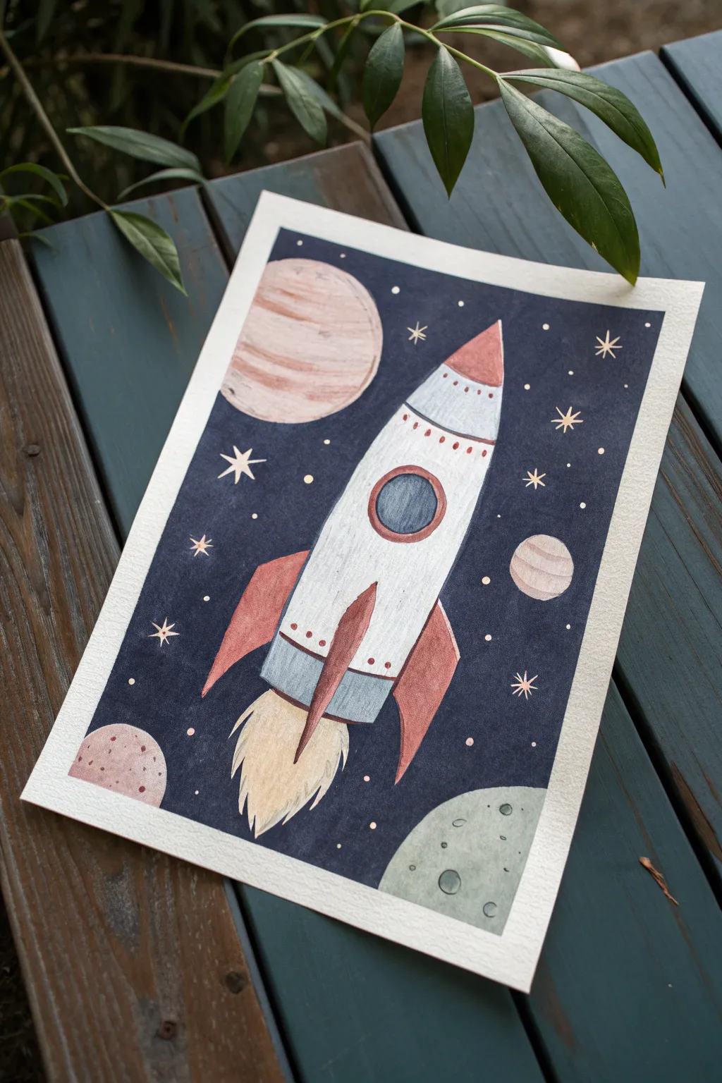 Easy acrylic rocket ship in a starry sky with simple planets, a fun outer space idea for kids.