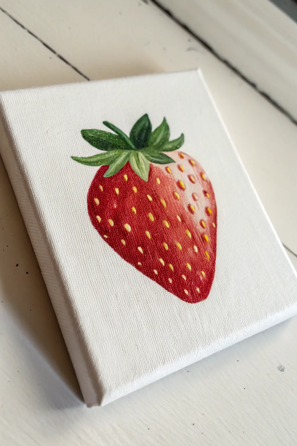 Beginner-friendly mini canvas: a cute strawberry with simple seeds and a bright highlight
