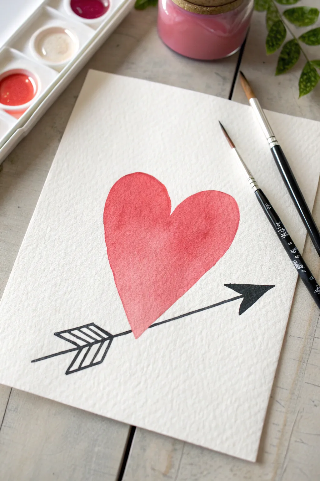 Super simple Cupid arrow heart in a minimalist palette, perfect for easy Valentine painting