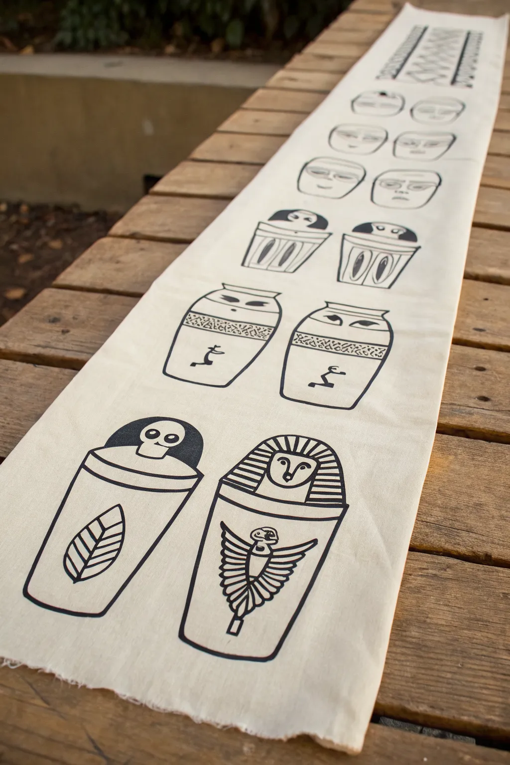 Easy canopic jar faces: four minimalist jar sketches in a clean row, perfect for beginners