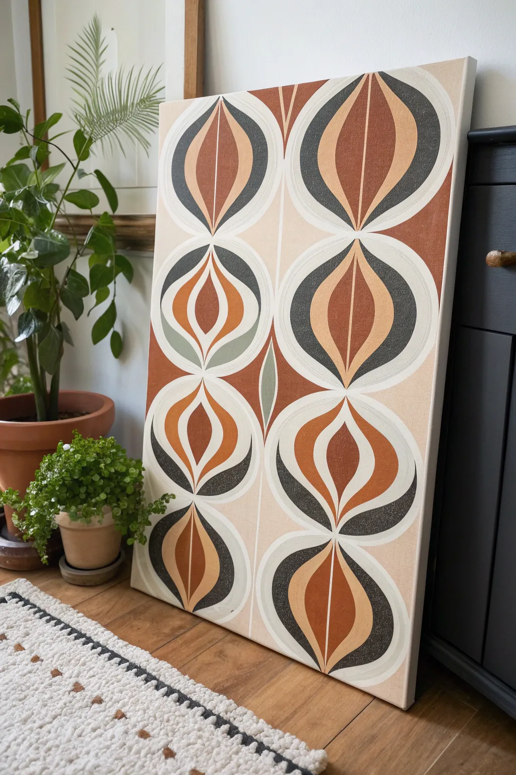 Mid-century boomerang and pebble motif pattern painting, clean Scandinavian contrast with boho warmth.