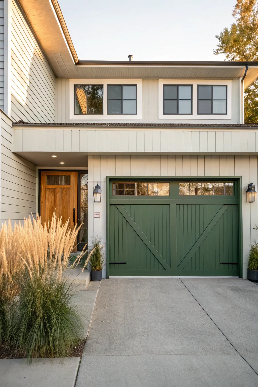 Paint your garage door in the same accent hue as the entry for a cohesive, modern curb appeal.