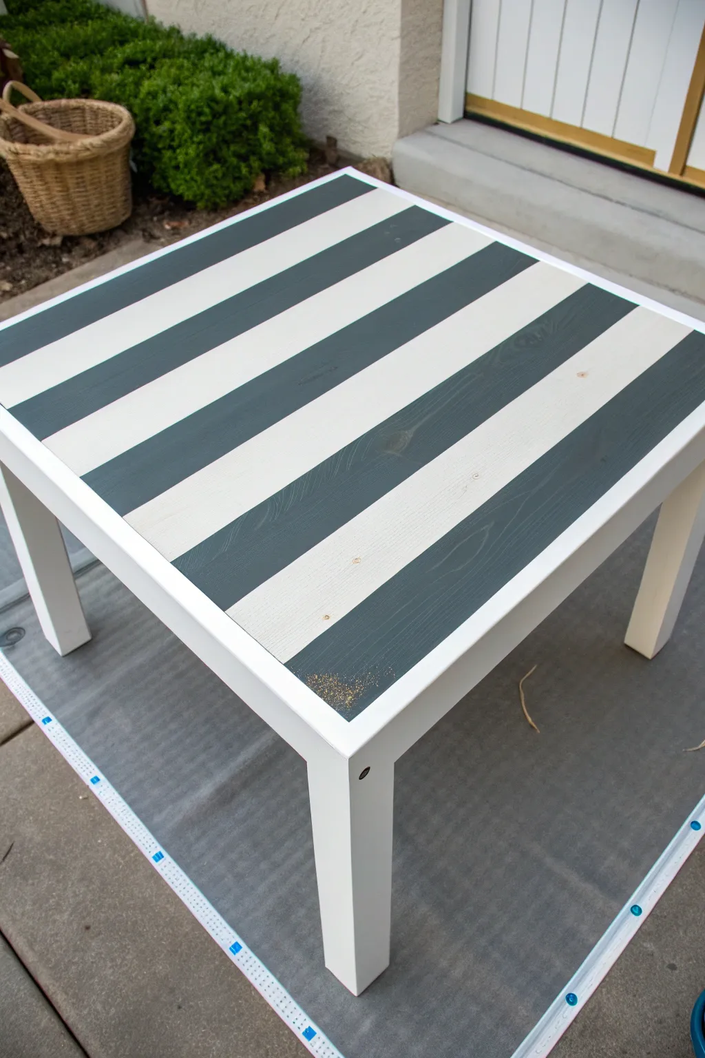 Bold tape line stripes transform a simple coffee table into a chic Scandinavian boho statement