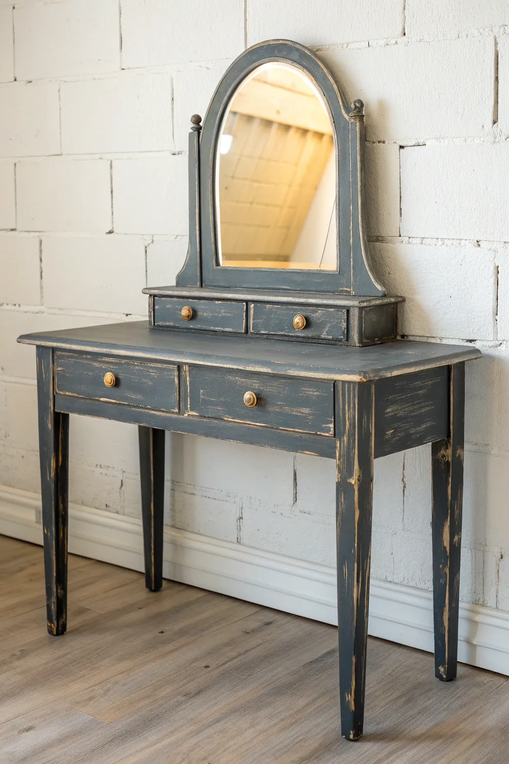 Graphic contrast: dark painted vanity with a pale mirror frame for a fresh antique update