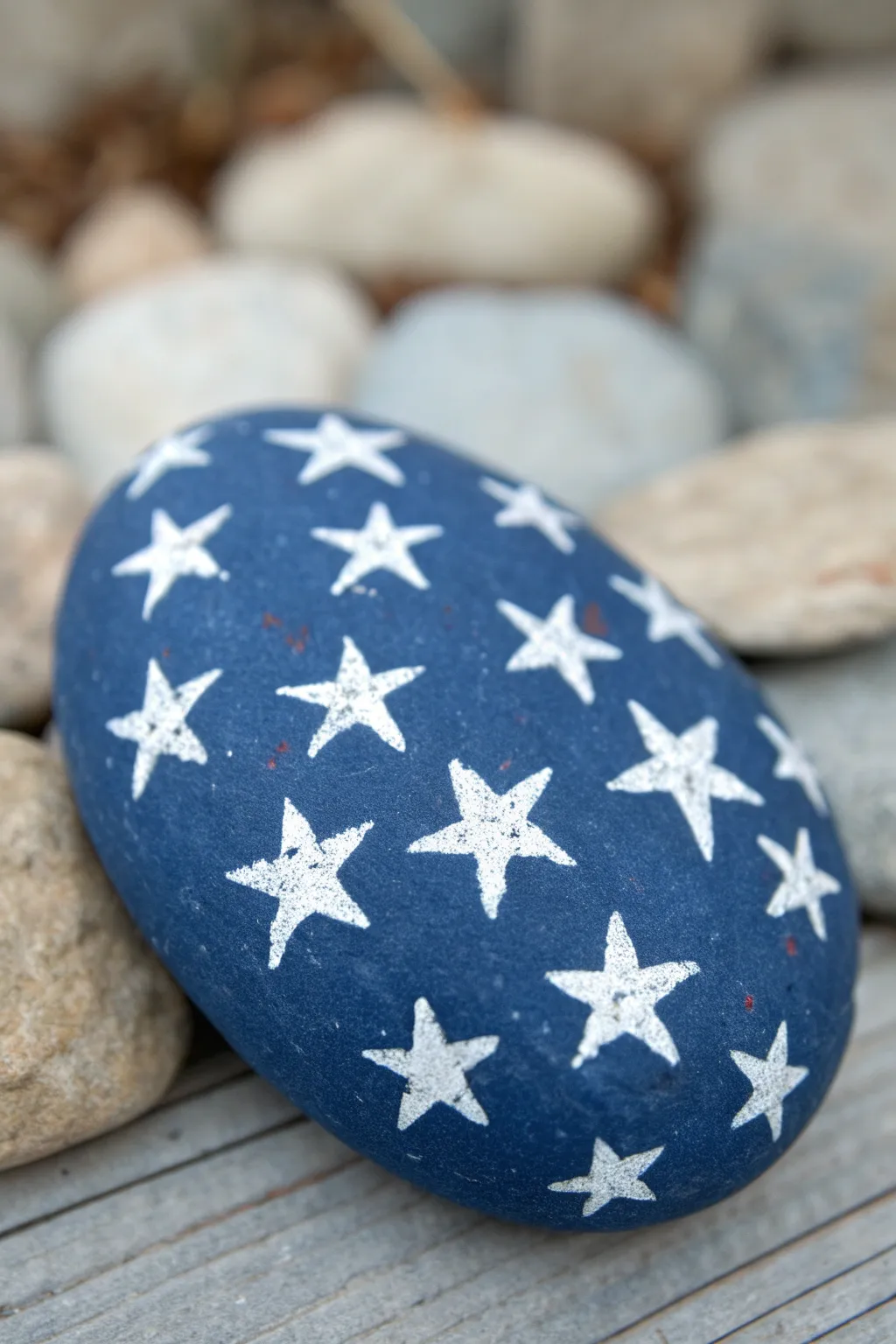 Navy rock with all-over tiny white stars, a minimalist patriotic pattern with handmade texture.