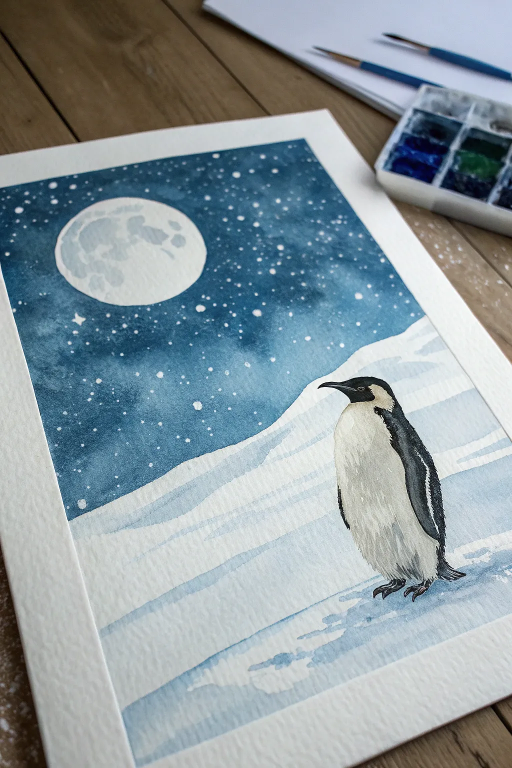 Moonlit minimalist penguin on a snowy hill with cool blue shadows and soft sparkly snow