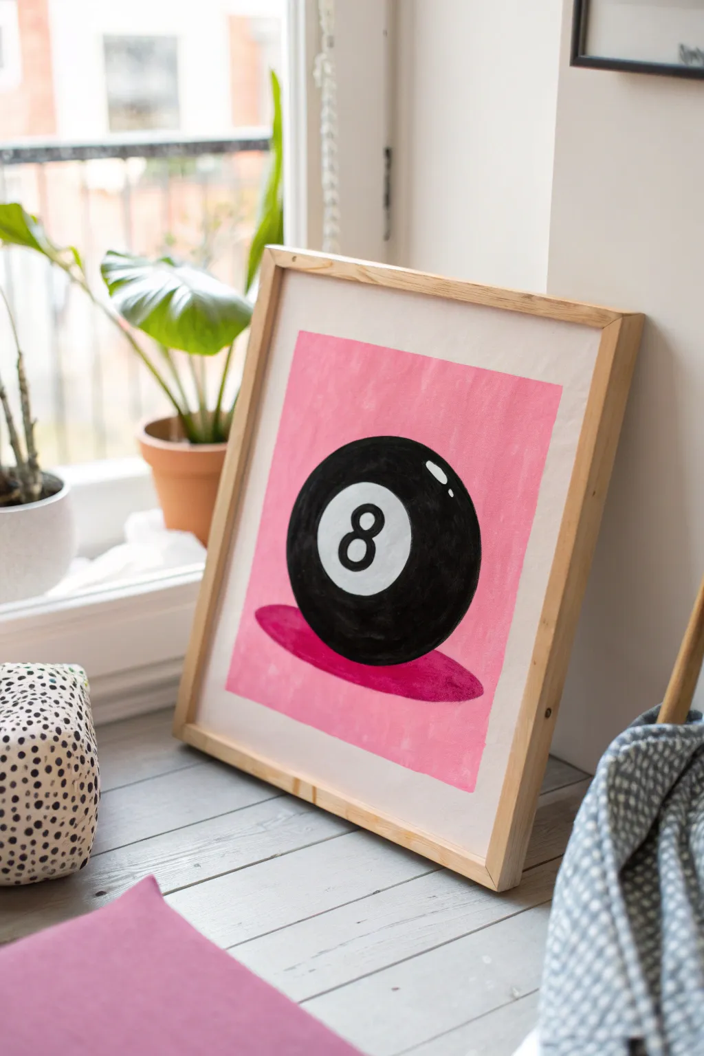 Bold pink pop-art 8-ball on clean paper, a preppy retro motif with minimalist Scandinavian flair.