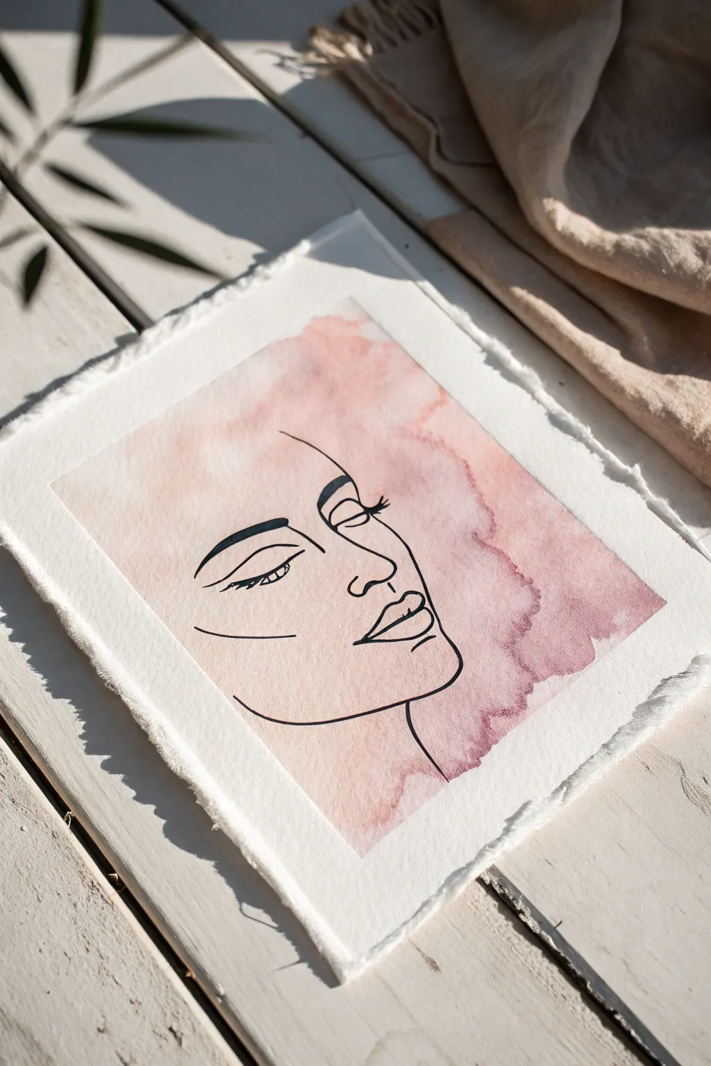 Minimalist one-line face over blush watercolor wash for a modern, pretty Scandinavian boho vibe.