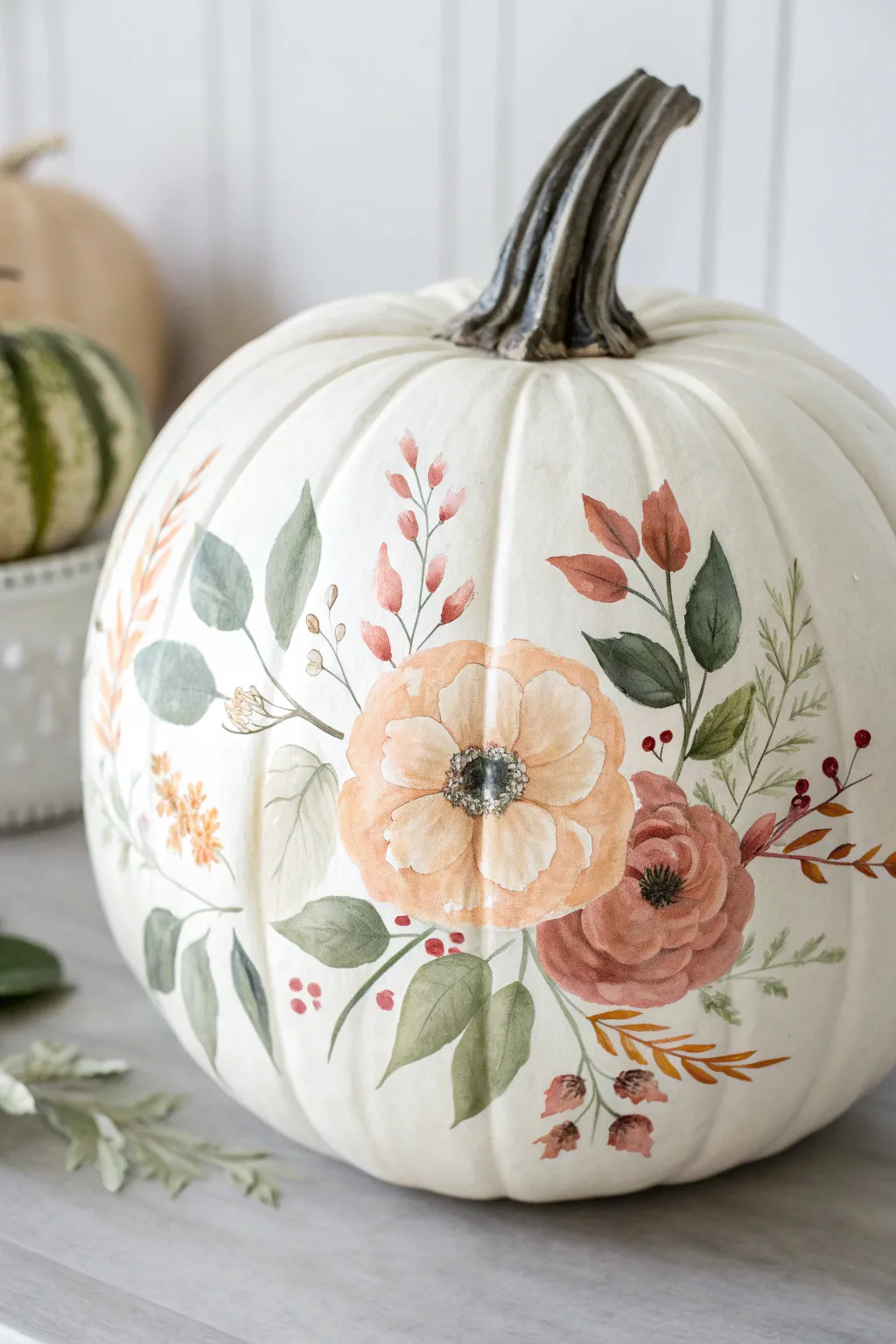 Airy watercolor botanical pumpkin with loose florals in soft neutrals, bright natural light