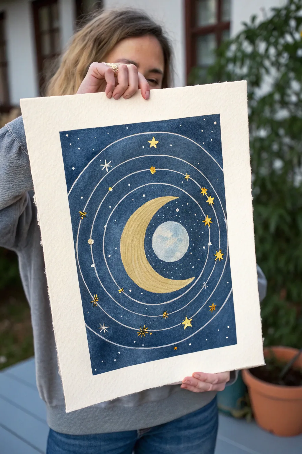 Glowing halo moon and stars in a minimalist night sky, perfect for dreamy starry night art.