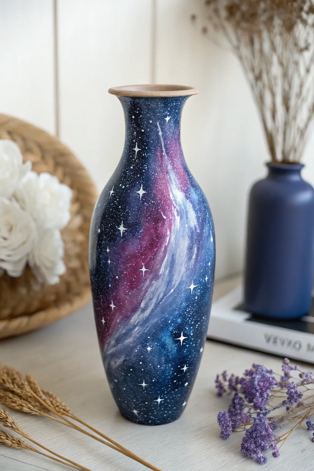 Capture the magic of the cosmos with this dreamy, hand-painted DIY galaxy vase design.