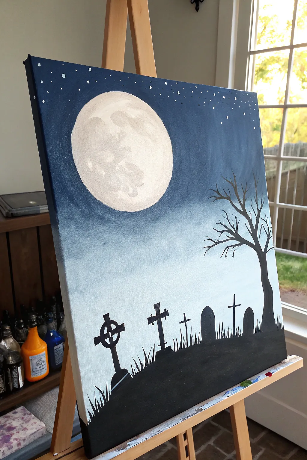 Minimalist acrylic graveyard horizon: bold silhouettes, misty haze, and a pale moon glow.