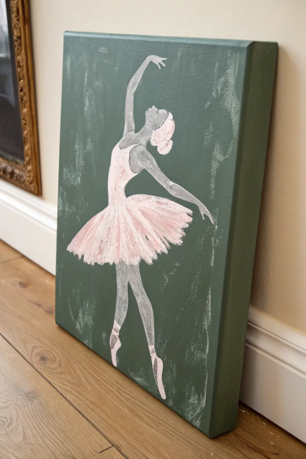 Minimal ballerina canvas idea: charcoal silhouette with a soft blush textured tutu.