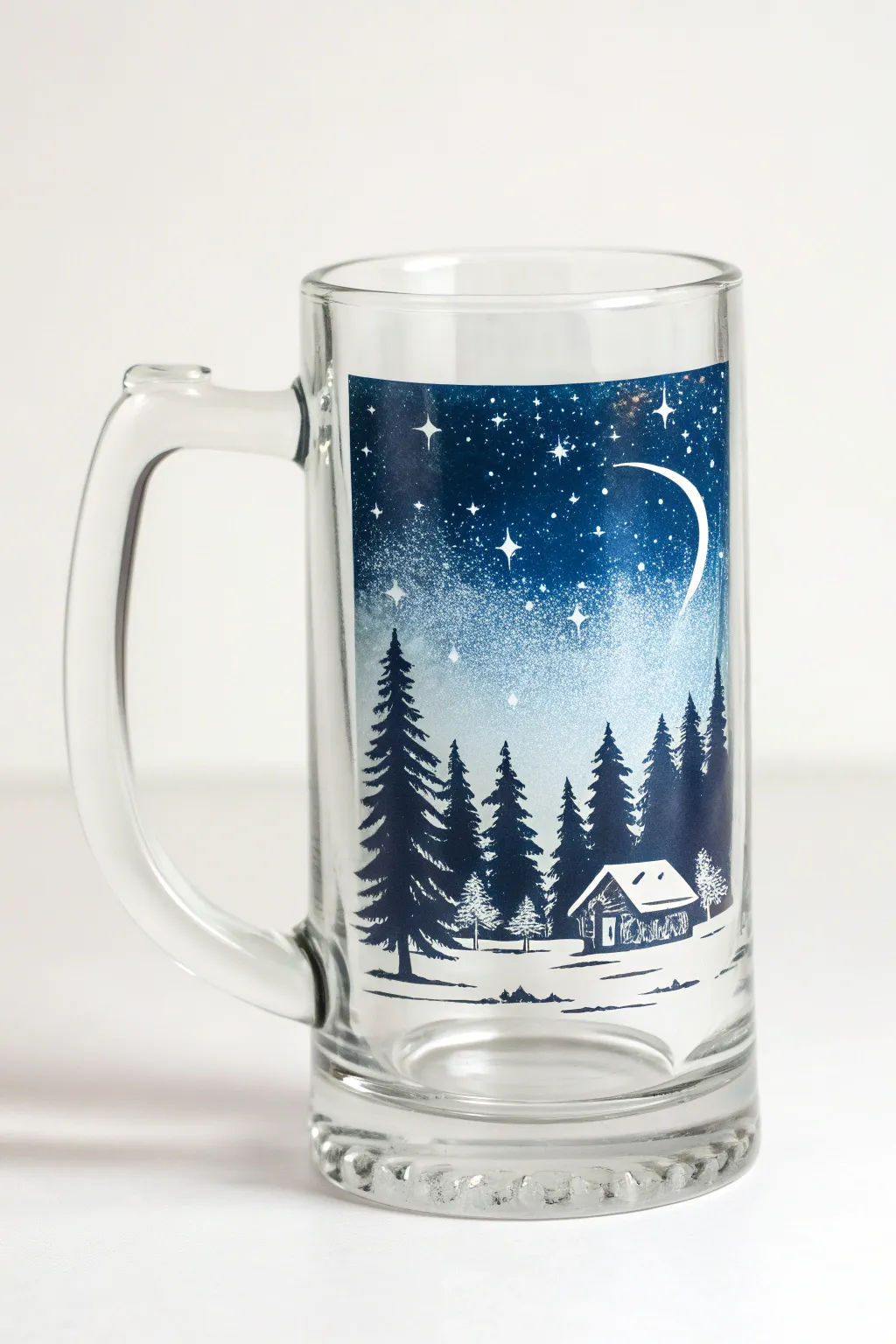 Cozy cabin and pine trees beneath a starry night sky, wrapped like a panorama on a beer mug