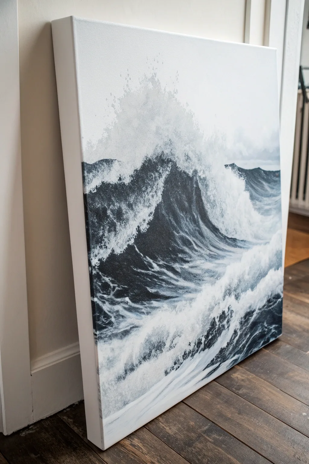 Ink-wash ocean waves on canvas with airy black and gray washes, splatter texture, calm yet bold.